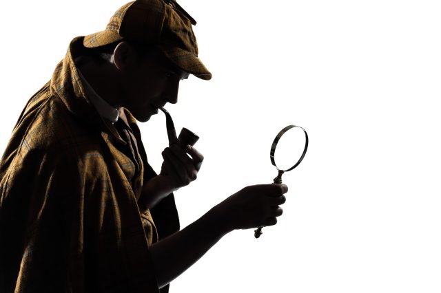 sherlock holmes silhouette in studio on white background